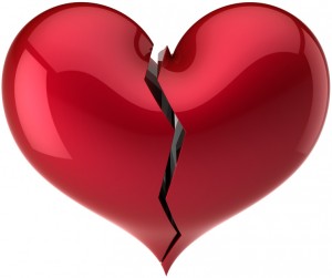 Heart shape broken with crack colored red. Love divorce